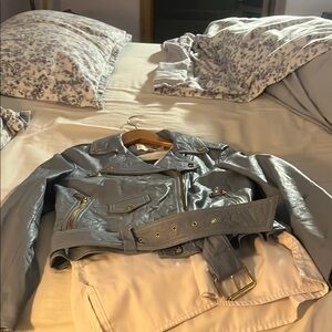 Stylish Gray Leather Jacket with Gold Accents